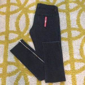 Faded black denim w/ zipper on calfs